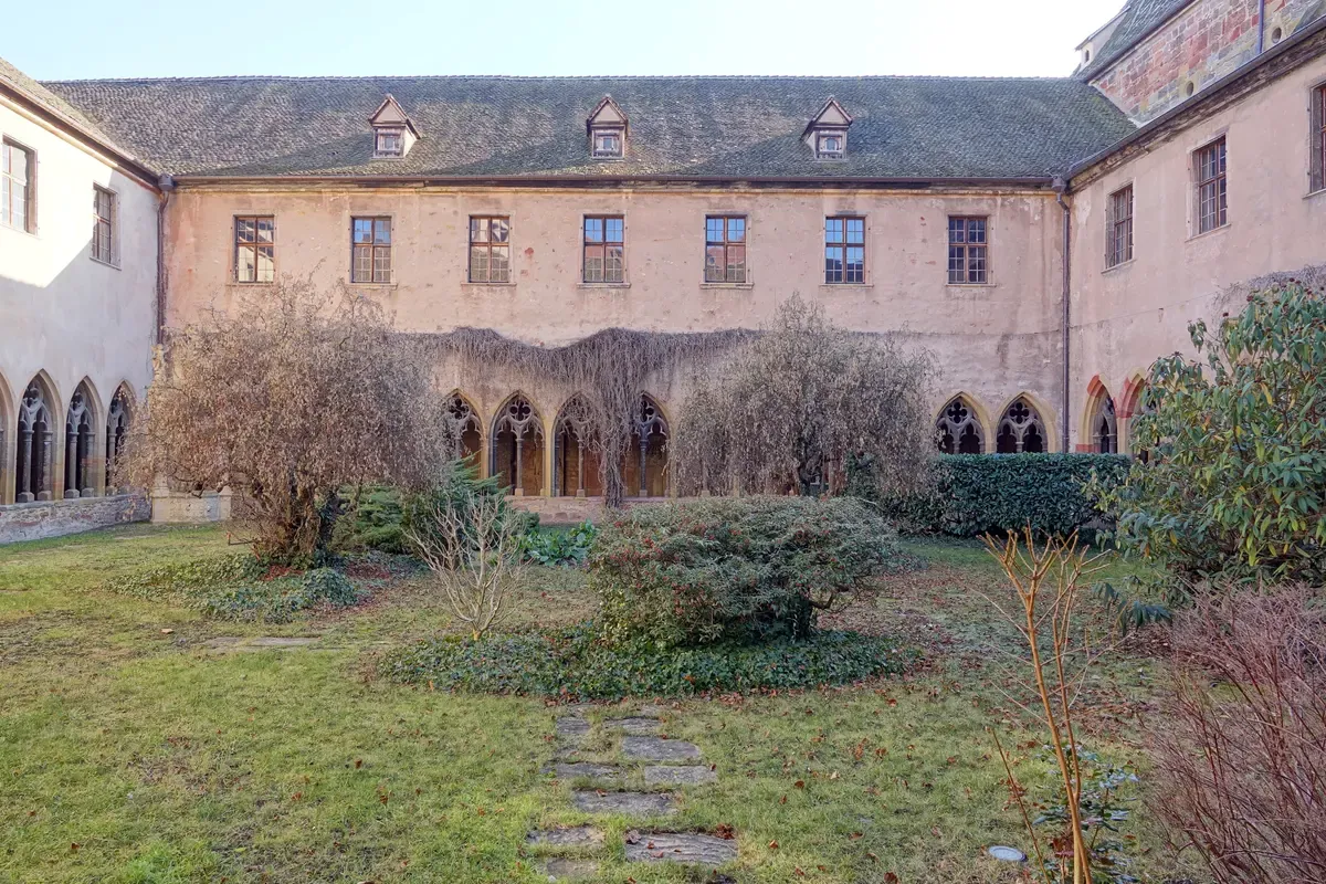 Cloister courtyard of the Unterlinden Museum in Colmar with its lawn and arcades